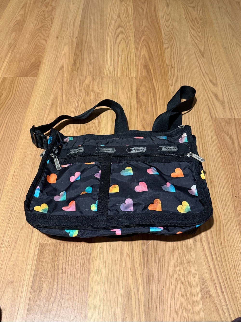 LeSportsac Black Crossbody Bag with Multicolor Heart Print